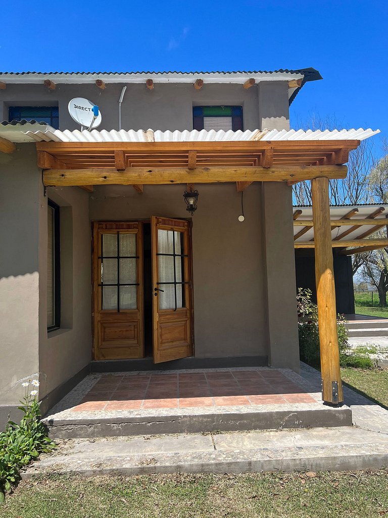 Cabaña Sonko: Vistas, Jardín y Chimenea