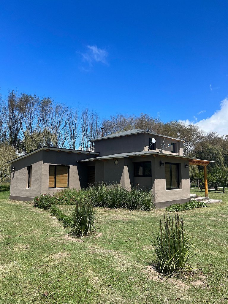 Cabaña Sonko: Vistas, Jardín y Chimenea