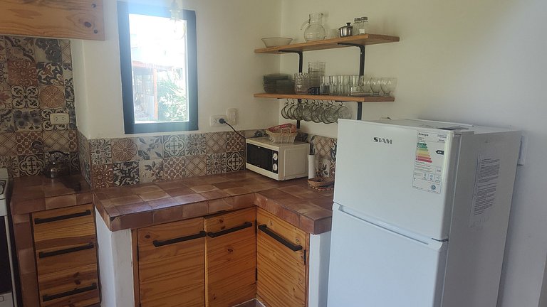 Cabaña Sonko: Vistas, Jardín y Chimenea