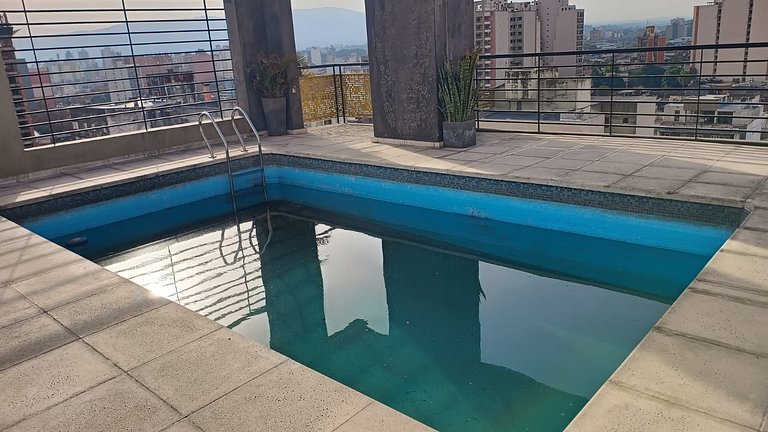 Moderna Suite GPT with a swimming pool and parking