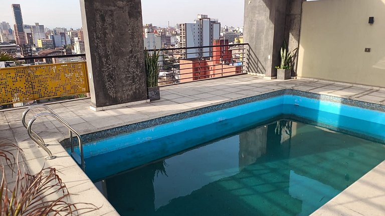 Moderna Suite GPT with a swimming pool and parking