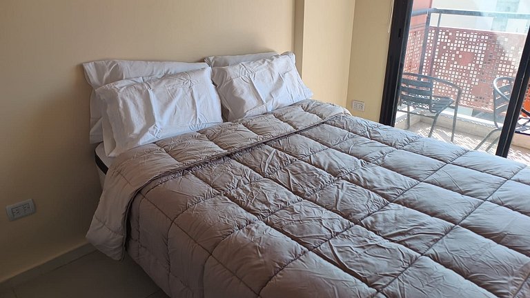 Moderna Suite GPT with a swimming pool and parking
